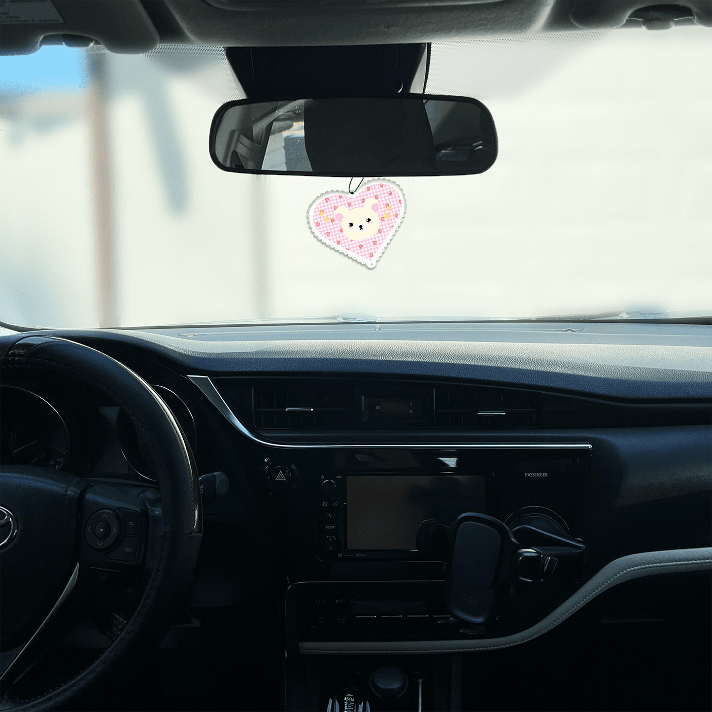 rose scented design featuring white bear in a pink heart car air freshener, decorative hanging car accessory with fragrance.