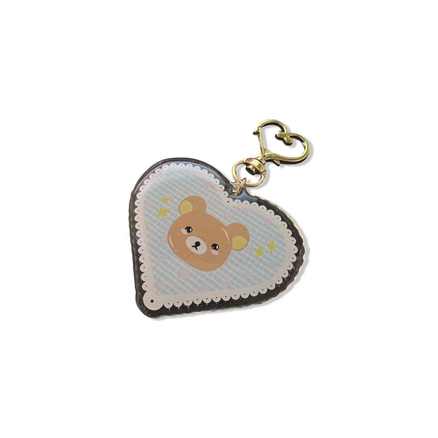 Brown bear acrylic keychain with micro-glitter finish and gold heart hook.