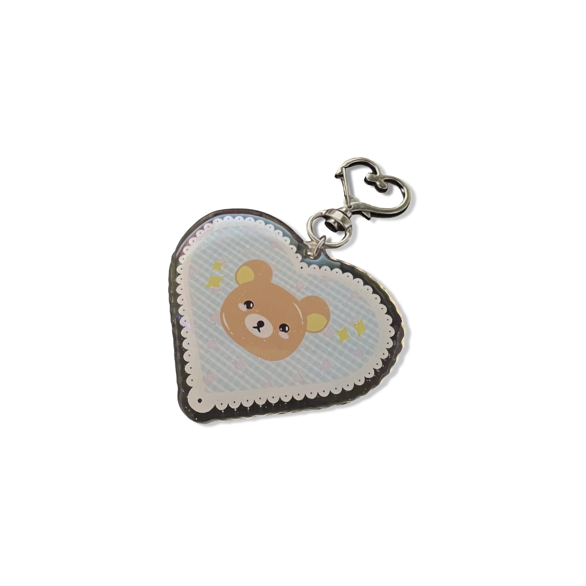 Brown bear acrylic keychain with micro-glitter finish and silver heart hook.