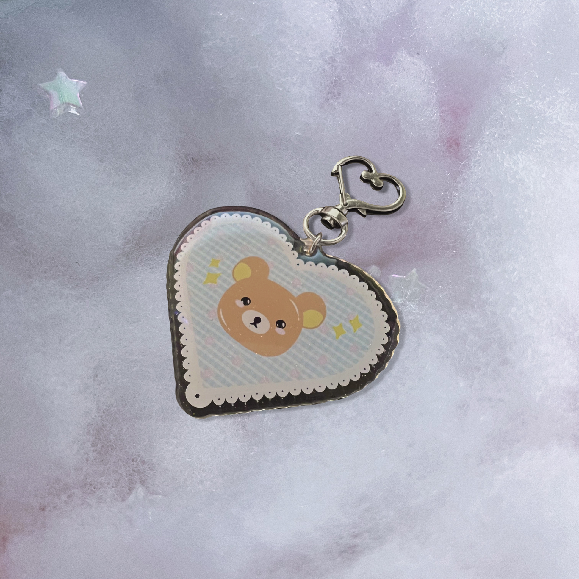 Brown bear acrylic keychain with micro-glitter finish and silver heart hook.