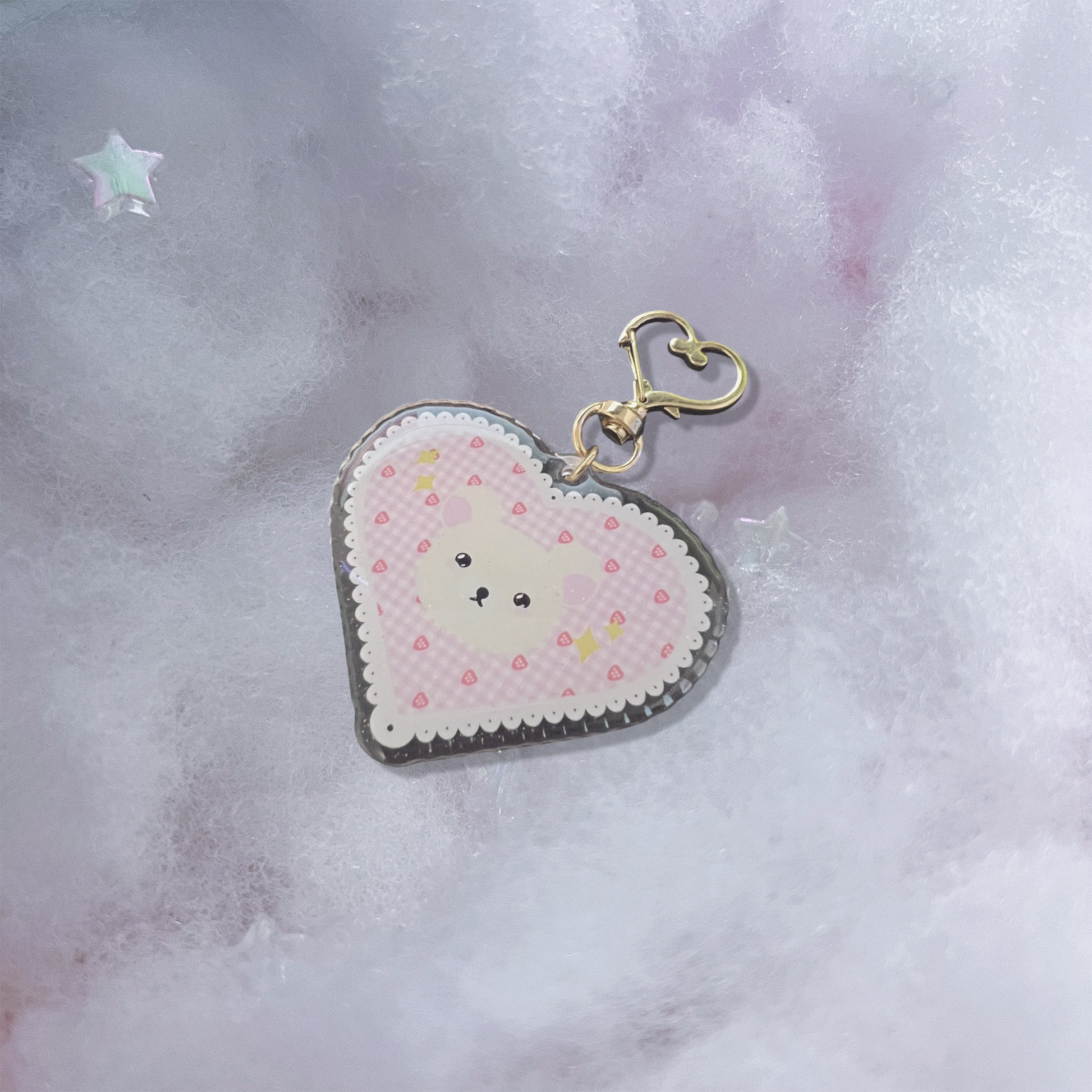 White bear acrylic keychain with micro-glitter finish and gold hearthook.