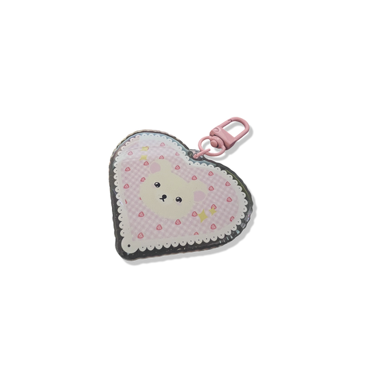 White bear acrylic keychain with micro-glitter finish and pink hook.