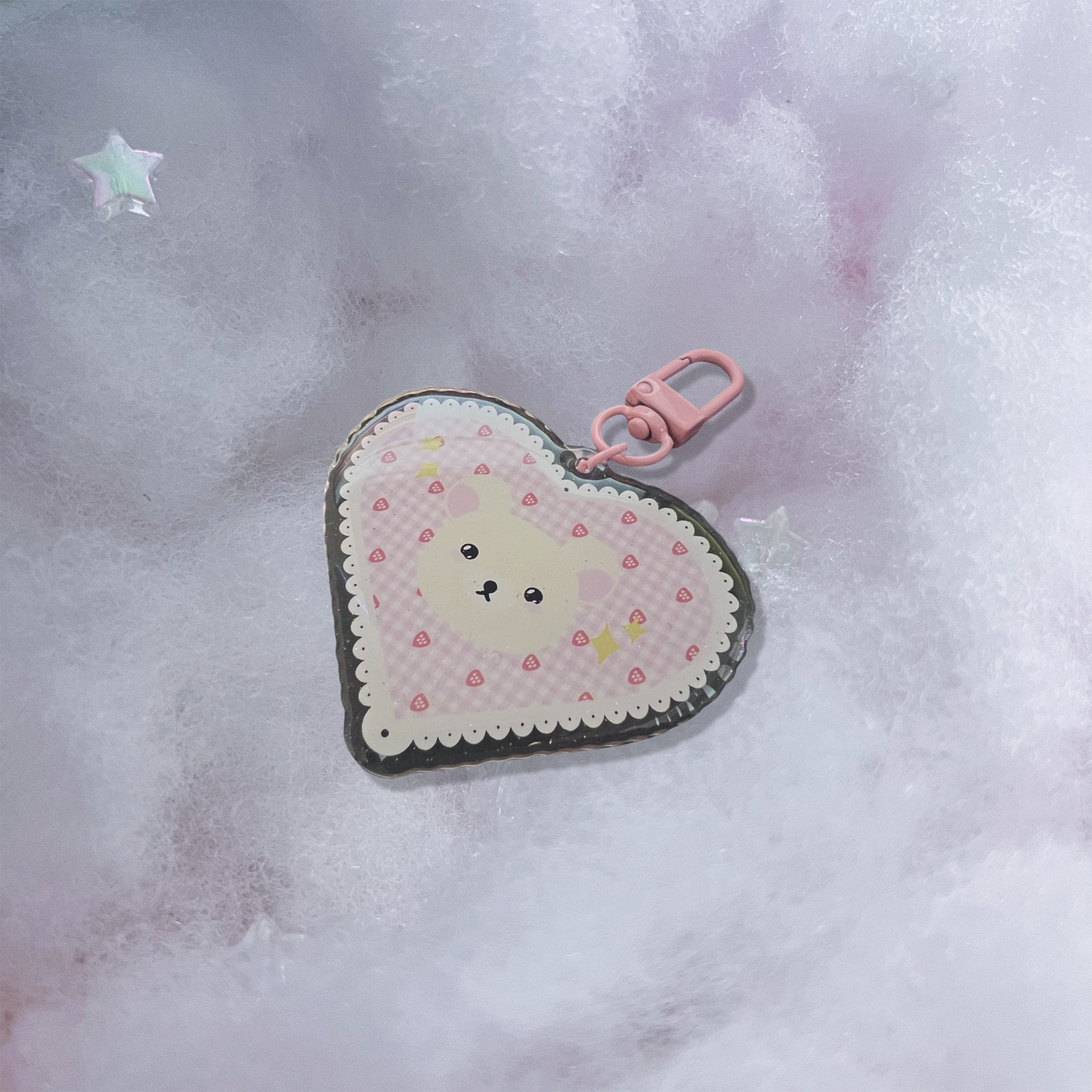White bear acrylic keychain with micro-glitter finish and pink hook.