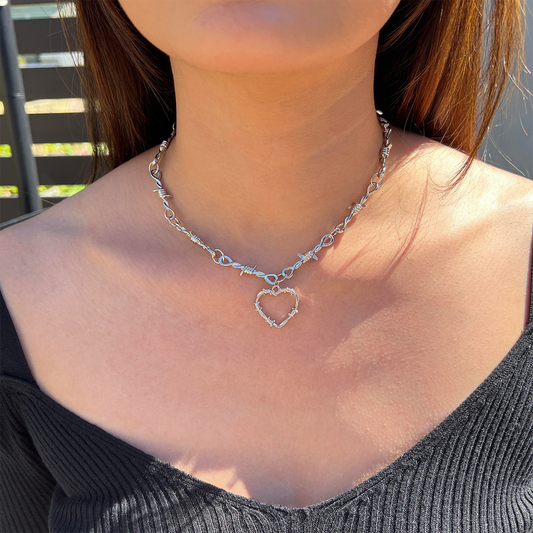 SOFT BUT DEADLY BARBED HEART NECKLACES { METAL HEART }