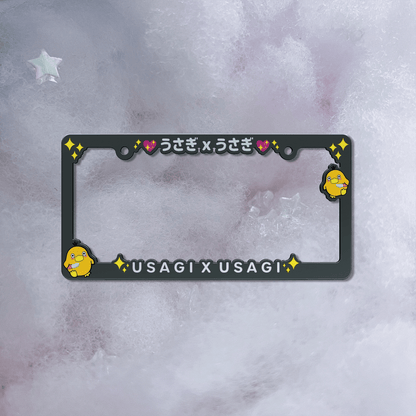 duck with knife with usagi x usagi lettering anime-themed decorative car license plate with printed character design.