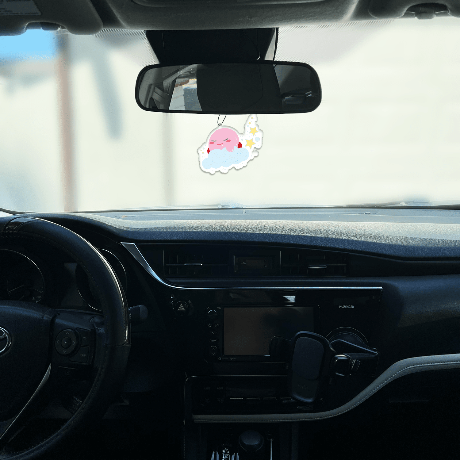 lavender scented design featuring pink puff ball on a cloud air freshener, decorative hanging car accessory with fragrance.