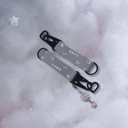 soft but deadly grey with white grid and star charm kawaii key strap, wrist strap accessory for keys and bags.