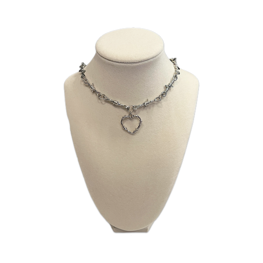 SOFT BUT DEADLY BARBED HEART NECKLACES { METAL HEART }