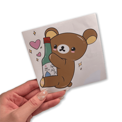 bear hugging soju bottle vinyl sticker, decorative waterproof sticker for laptops, water bottles, and cars.
