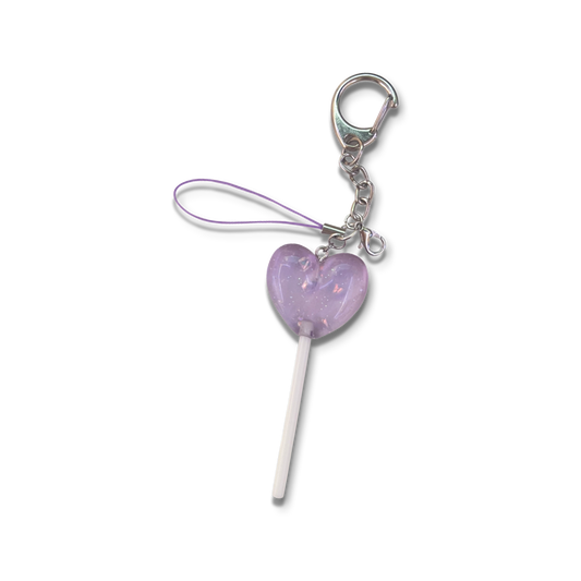 Big purple sparkly lollipop with keychain and basic purple phone strap.
