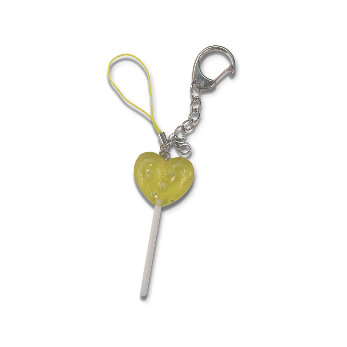 Big yellow sparkly lollipop with keychain and basic yellow phone strap.
