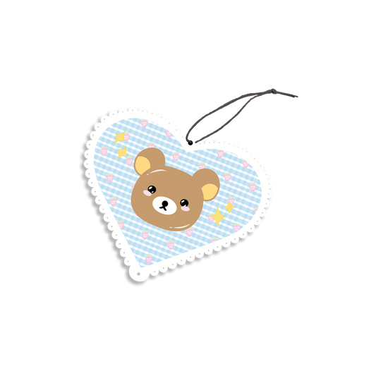 Brown Bear Air Freshener design is a brown bear inside a blue lace-scalloped heart with yellow sparkles.