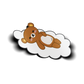 Sleeping Kuma Sticker design features sleeping brown bear on a cloud.
