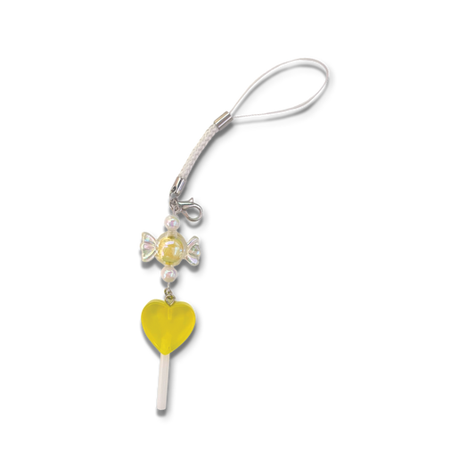 Small yellow lollipop and yellow candy charm with white braided phone strap.